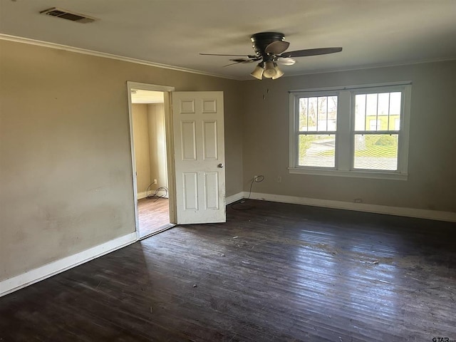 interior space with ornamental molding, dark hardwood / wood-style floors, and ceiling fan