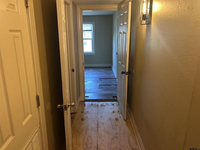 hall featuring light hardwood / wood-style floors