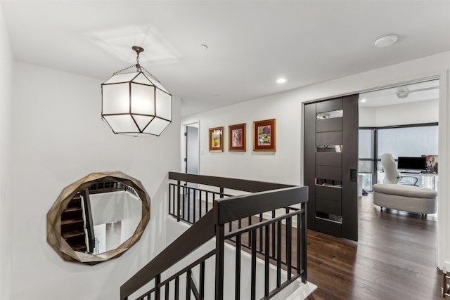 hallway with dark wood-type flooring