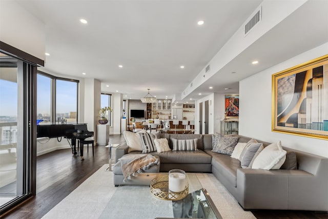 living room featuring dark wood-type flooring