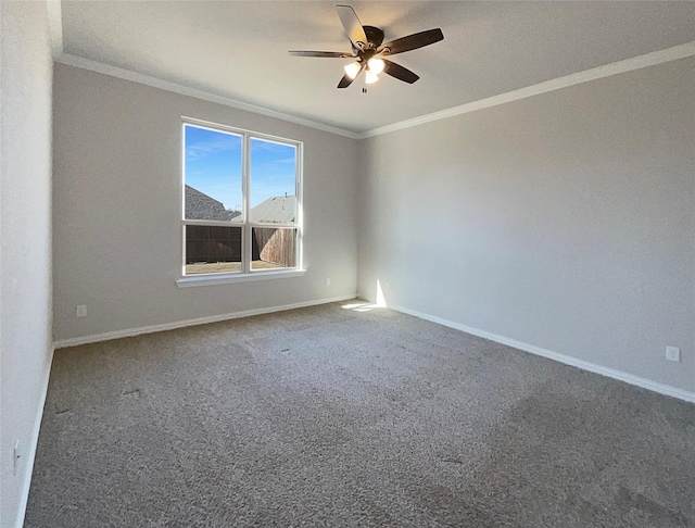 unfurnished room with crown molding, ceiling fan, and carpet flooring