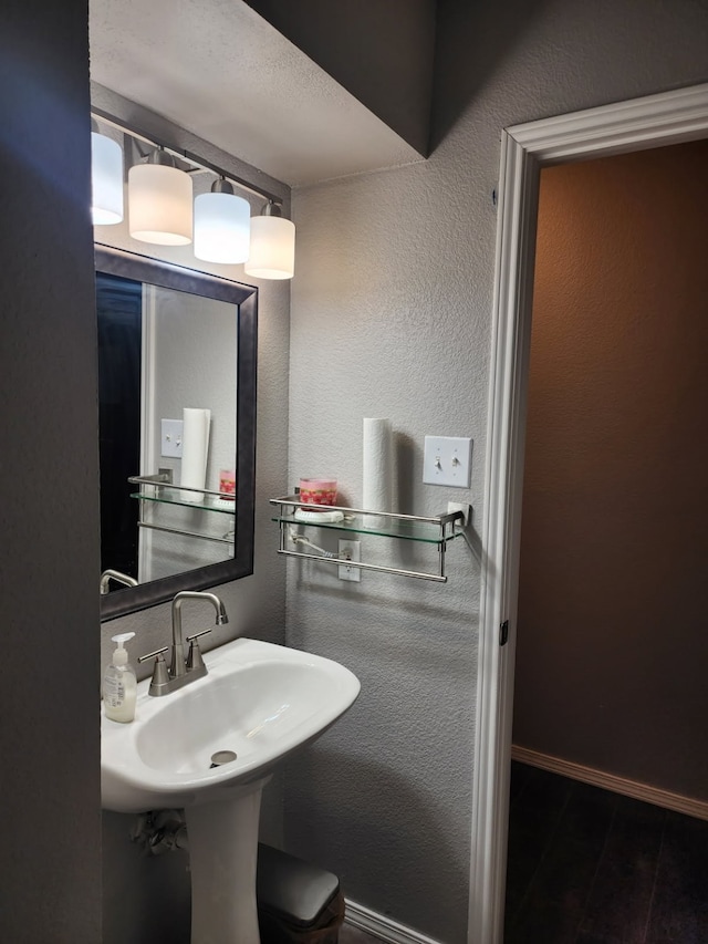 bathroom featuring hardwood / wood-style flooring and sink