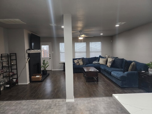 living room with hardwood / wood-style floors and ceiling fan