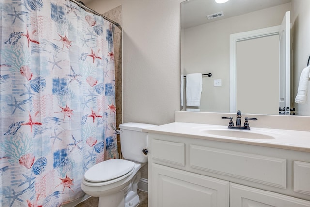 full bathroom featuring curtained shower, visible vents, vanity, and toilet