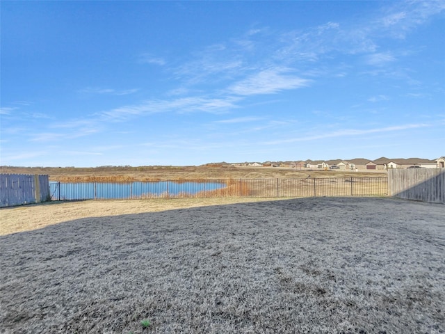 view of yard with a water view