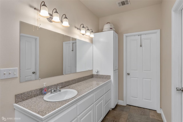 bathroom featuring vanity