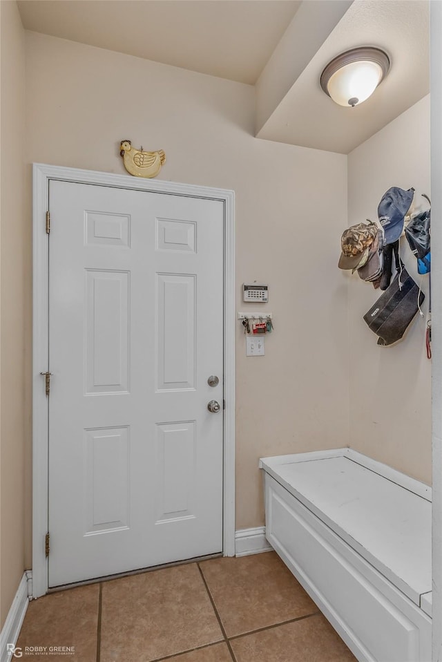 mudroom with light tile patterned floors