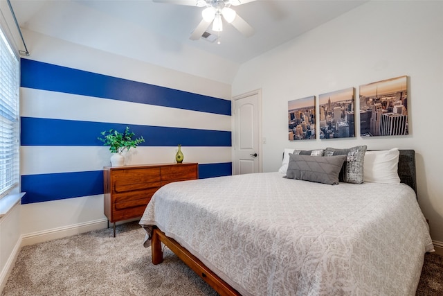 carpeted bedroom with lofted ceiling and ceiling fan