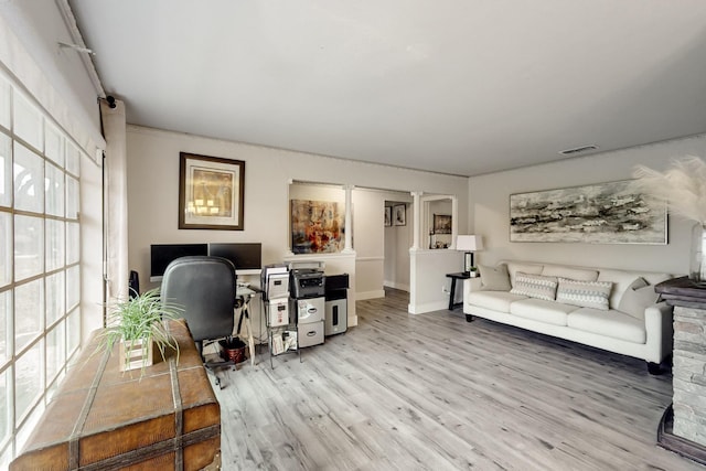 office area with light wood-type flooring