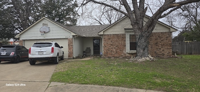 ranch-style home featuring a garage and a front yard