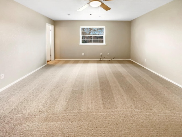 unfurnished room with carpet floors and ceiling fan