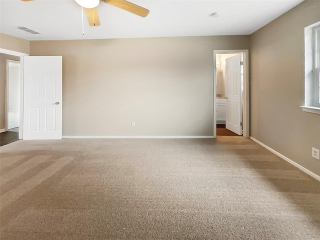 unfurnished bedroom featuring carpet floors and ceiling fan