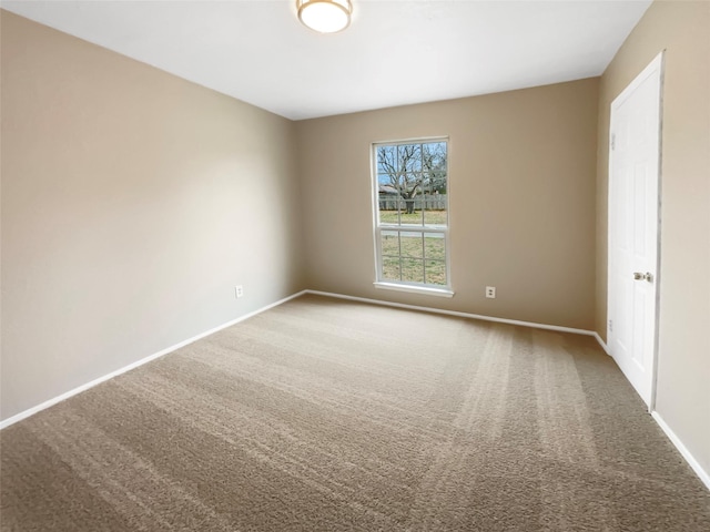 unfurnished room with carpet