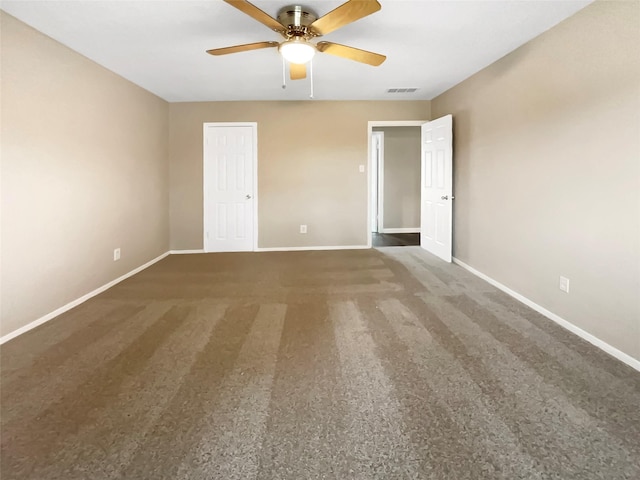 unfurnished bedroom featuring carpet flooring and ceiling fan