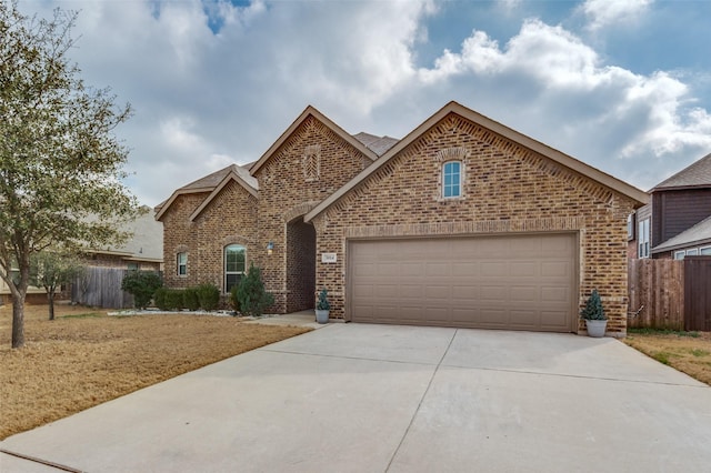 view of front of property featuring a garage