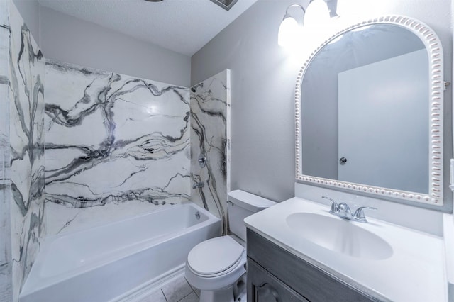 full bathroom featuring tiled shower / bath, vanity, toilet, tile patterned floors, and a textured ceiling