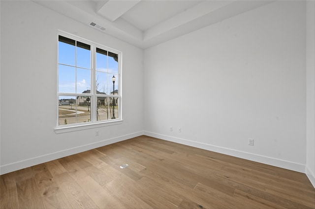 unfurnished room featuring light hardwood / wood-style flooring