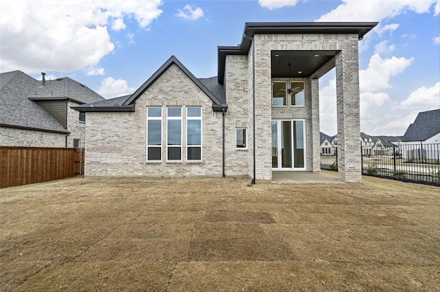 rear view of house with a patio area