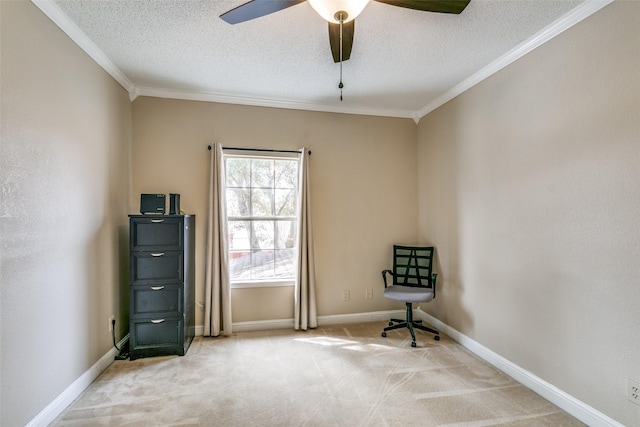 unfurnished room featuring light carpet, ornamental molding, a textured ceiling, and baseboards