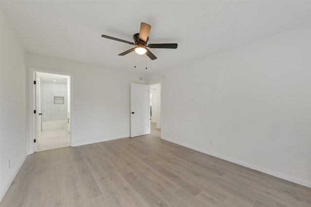 unfurnished room with light hardwood / wood-style flooring and ceiling fan