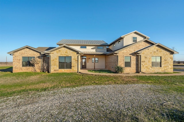 view of front of home with a front yard