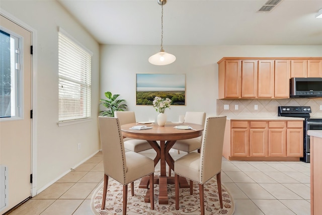 view of tiled dining area