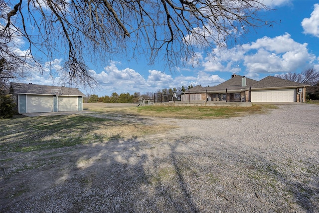 view of yard featuring a garage