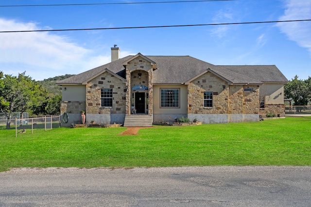 view of front of property with a front lawn