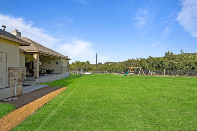 view of yard featuring a playground