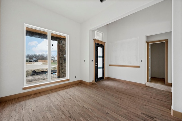 unfurnished room featuring wood-type flooring