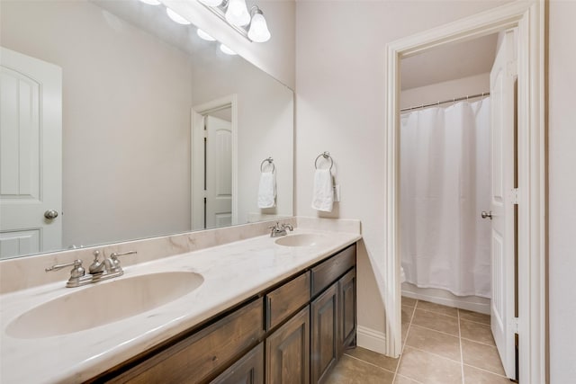 bathroom with vanity and tile patterned floors