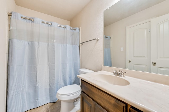 bathroom featuring vanity, curtained shower, tile patterned floors, and toilet