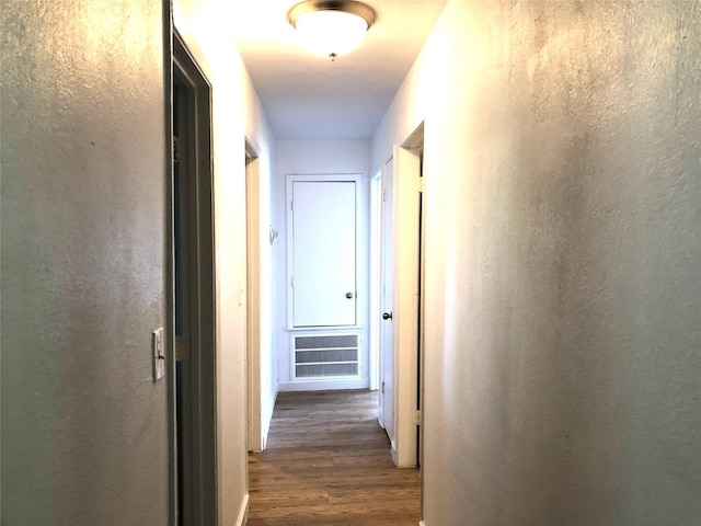 hall featuring dark hardwood / wood-style floors