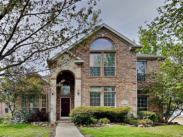 10805 Winged Foot Dr, Rowlett, TX 75089 - view of front of property with a front yard