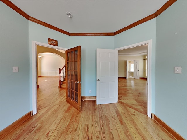 10805 Winged Foot Dr, Rowlett, TX 75089 - unfurnished room featuring crown molding and light hardwood / wood-style flooring
