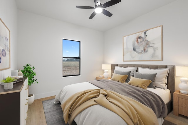 bedroom featuring ceiling fan and light wood-type flooring