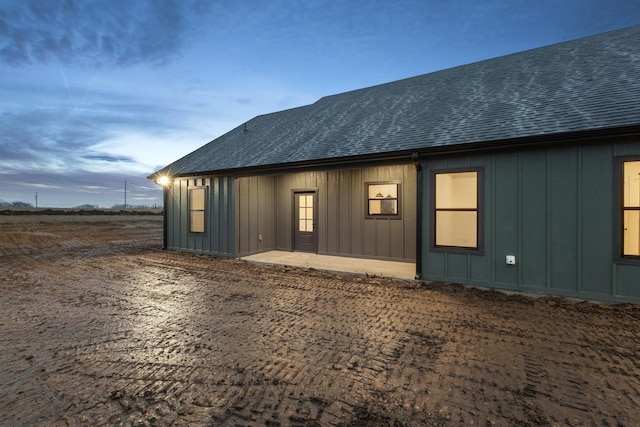 view of property exterior at dusk