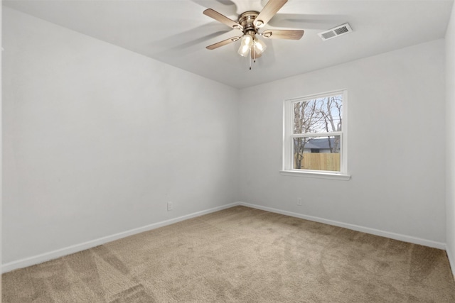 carpeted empty room with ceiling fan