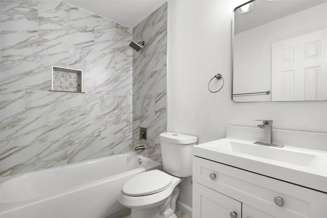 full bathroom featuring tiled shower / bath combo, vanity, and toilet