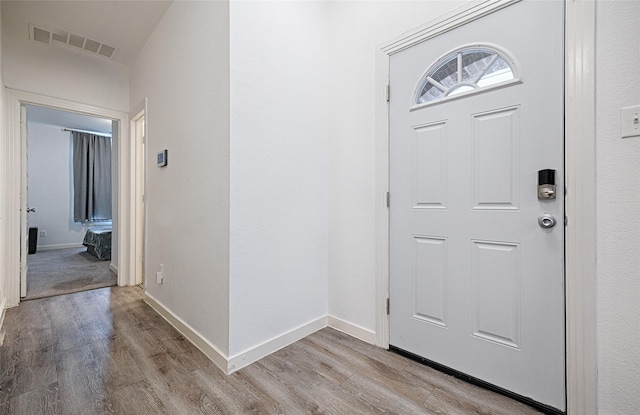 foyer entrance featuring light wood-type flooring