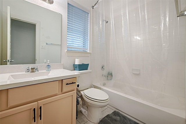 full bathroom featuring shower / tub combo, vanity, tile patterned floors, and toilet