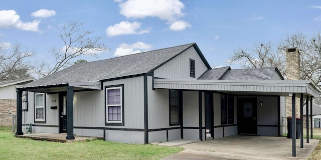 view of front of house featuring a carport