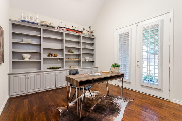 office space featuring baseboards, vaulted ceiling, dark wood-type flooring, and french doors