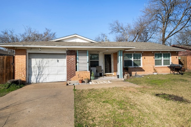 single story home featuring a garage and a front yard