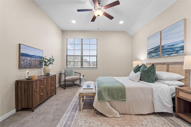 carpeted bedroom with lofted ceiling and ceiling fan