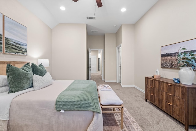 bedroom with light carpet, lofted ceiling, and ceiling fan