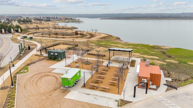 bird's eye view with a water view