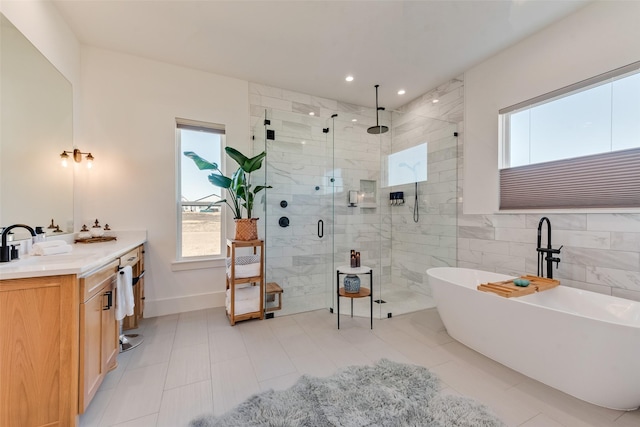 bathroom featuring vanity, tile walls, and plus walk in shower