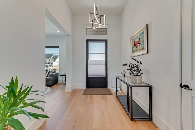 foyer entrance featuring light wood-type flooring