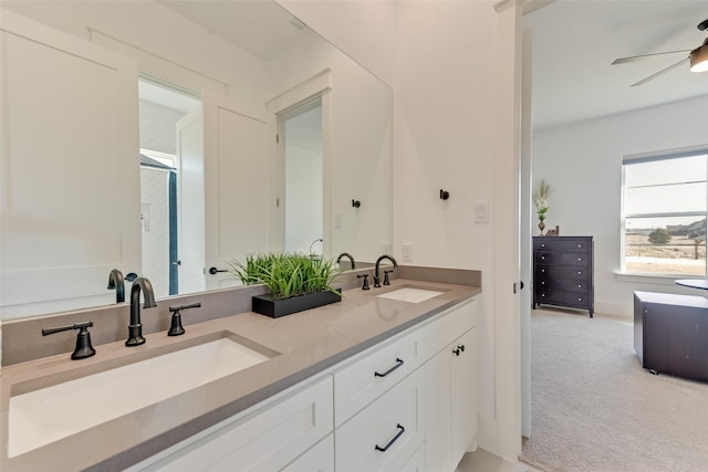 bathroom featuring vanity and ceiling fan